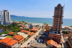 Apto em Pereque com vista para o mar
